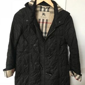 Burberry raincoat size Xs.